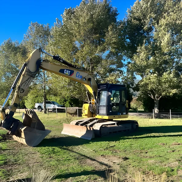 CAT excavator on a rural block near Devonport, Tasmania