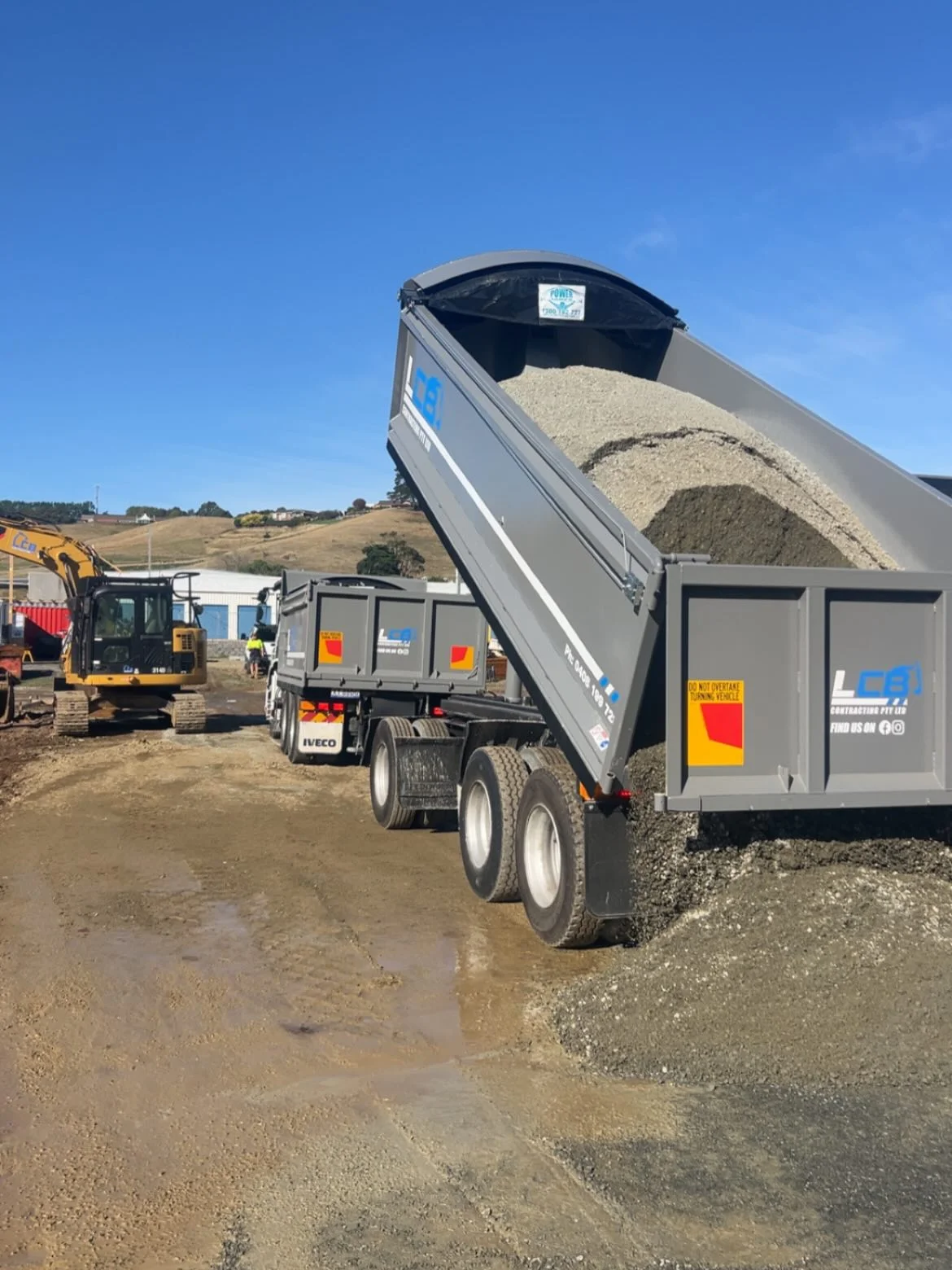 LCB truck and trailer tipping gravel